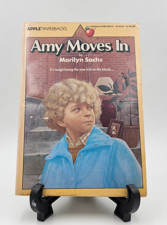 Amy Moves In by Marilyn Sachs (Amy and Laura Series #1)