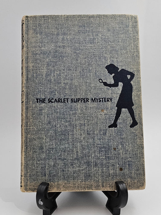 The Scarlet Slipper Mystery By: Carolyn Keene