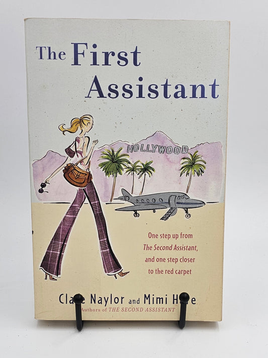 The First Assistant: A Continuing Tale from Behind the Hollywood Curtain by Clare Naylor and Mimi Hare (Lizzie Miller #2)