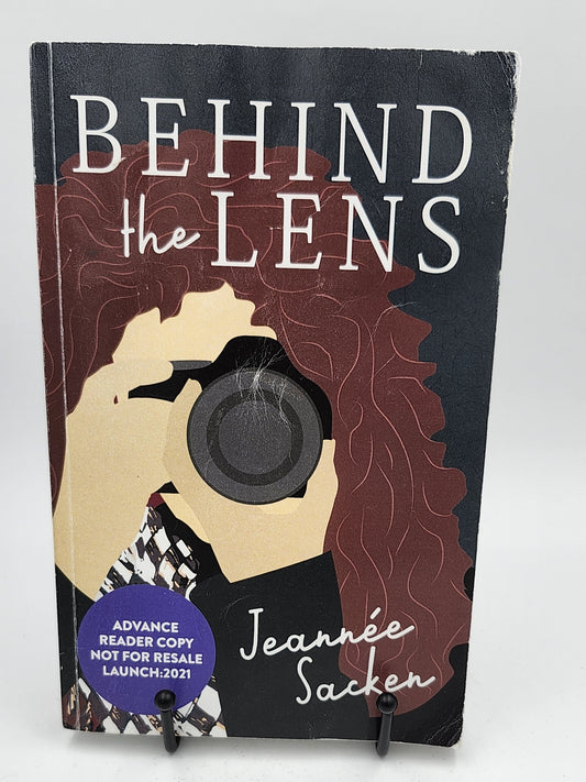 Behind the Lens by Jeannée Sacken **Advance Reader Copy**