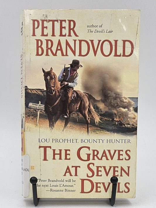 The Graves at Seven Devils by Peter Brandvold (Lou Prophet, Bounty Hunter #7)