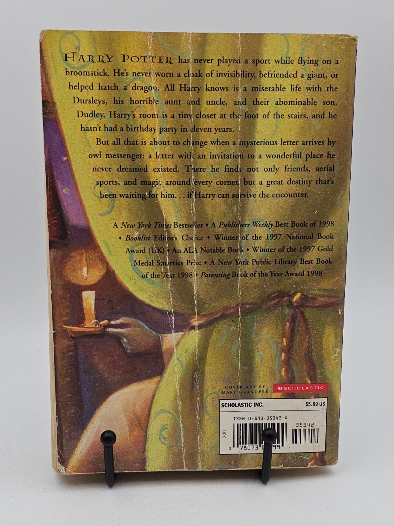 Harry Potter and the Sorcerer's Stone by J.K Rowling (Harry Potter #1)